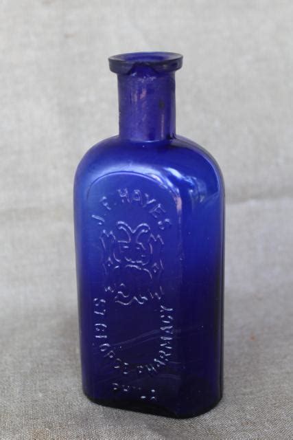 Antique Vintage Embossed Glass Medicine Bottle St George S Pharmacy Cobalt Blue Glass