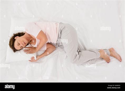 Mature Woman Sleeping Bed Hi Res Stock Photography And Images Alamy