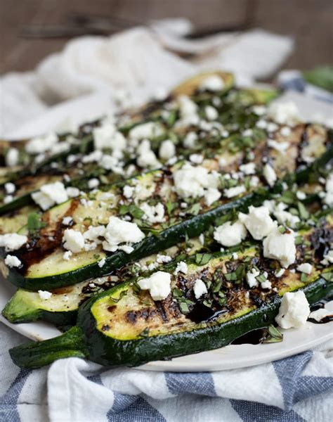 Grilled Zucchini With Balsamic Glaze Basil And Feta Feasting Not
