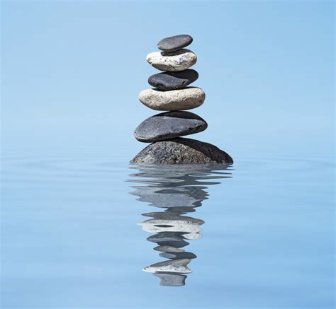 Zen Balanced Stones Stack In Lake Balance Peace Silence Concept