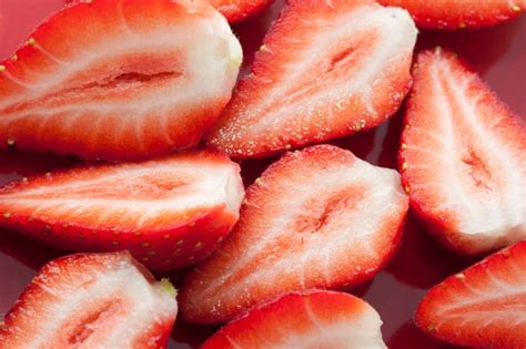 Fresh Tasty Strawberries Cut In Halves Free Stock Image