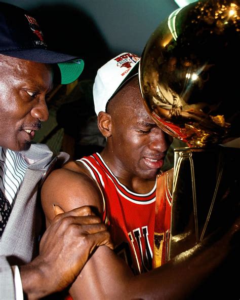 Michael Jordan Holding The First Bulls Championship Trophy In 1991