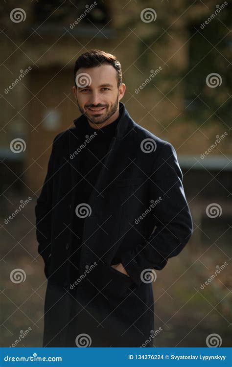 Handsome Smiling Man In Black Coat Stock Photo Image Of Countryside
