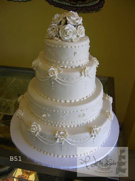 C511 Layered Fondant Wedding Cake With Elegant Rose Design