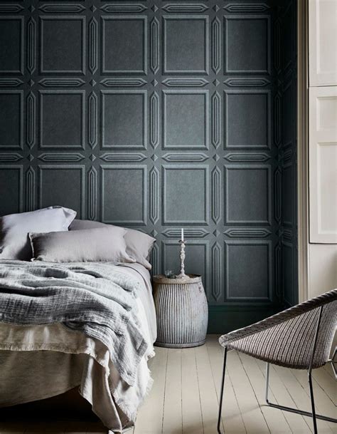 A Gray Bedroom With A Beautiful Wallpaper That Provides Texture To The