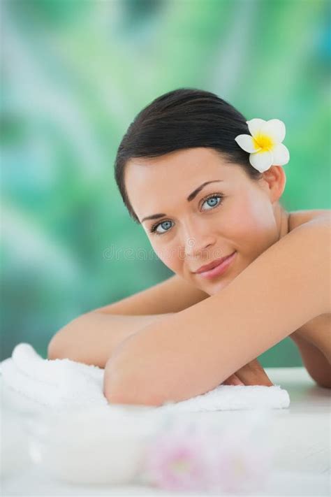Beautiful Brunette Relaxing On Massage Table Smiling At Camera Stock Image Image Of Adult