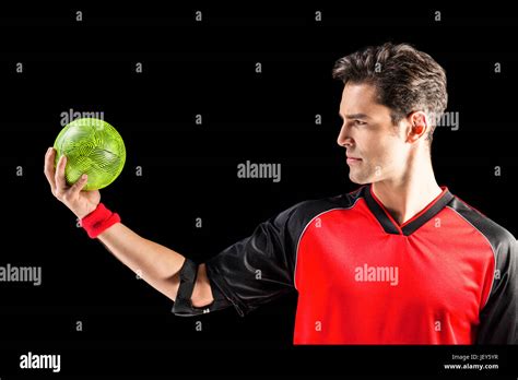 Confident Athlete Man Holding A Ball Stock Photo Alamy