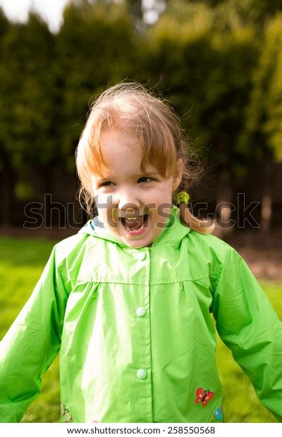 Portrait Young Girl Park Rain Coat Stock Photo 258550568 Shutterstock