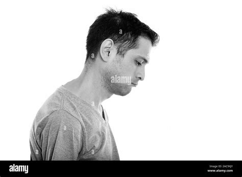 Profile View Of Sad Young Man Looking Down Stock Photo Alamy