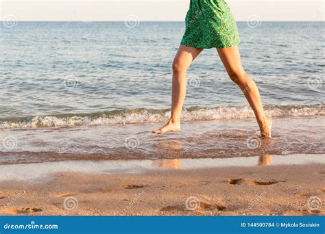 Leg Of Woman Running On Beach With Water Splashing Summer Vacation Stock Photo Image Of