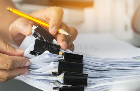 Businessman Hands Searching And Checking Write Unfinished Documents