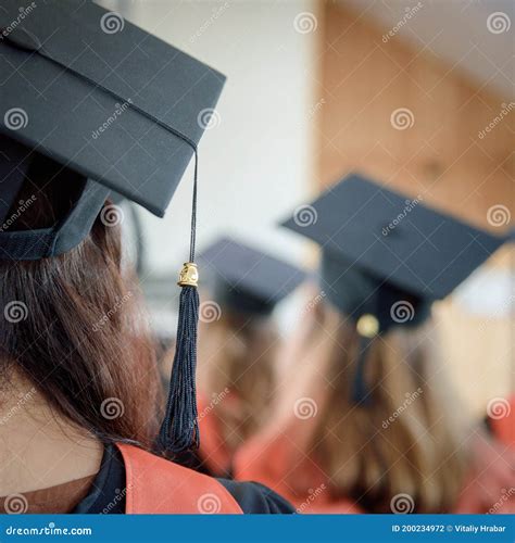 Women Graduates Of The University In Square Academic Caps With Tassel
