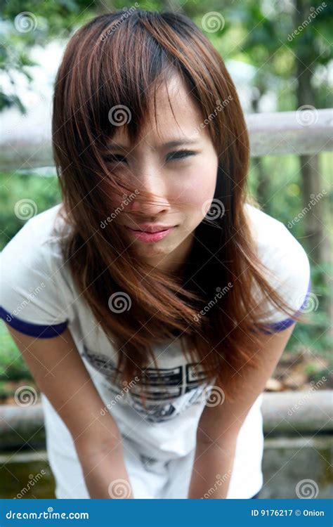 Cute Asian Girl Looking At Viewer Stock Image Image Of People Cool 9176217