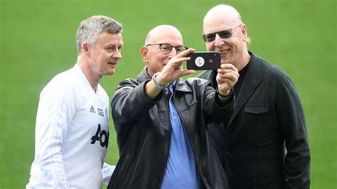 One who gives a glasslike or glossy surface to anything; Manchester United: The Glazers are setting Solskjaer for ...