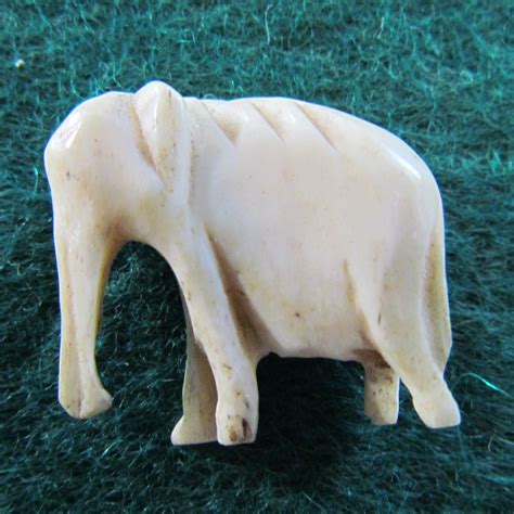 Ivory Carved Elephant Pendant Gumnut Antiques