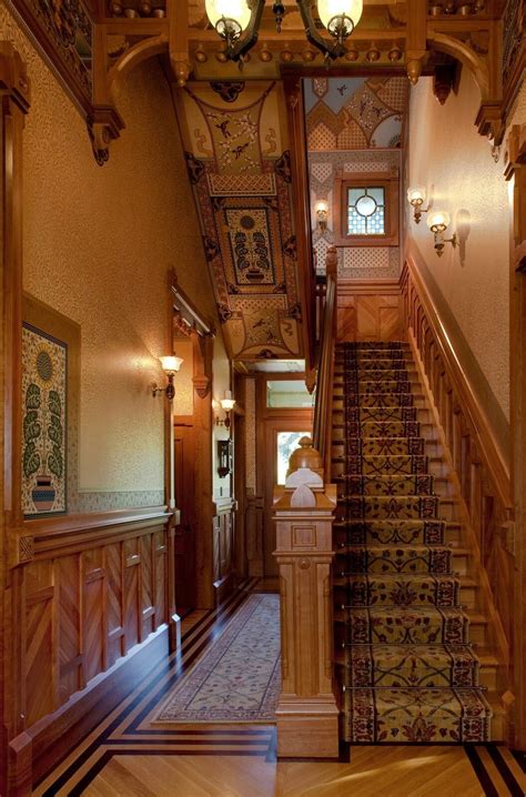 Heavy Dark Woods And Rich Colors Create A Stunning Hallway And