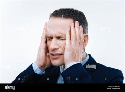 Unhappy Adult Man Closing His Eyes Stock Photo Alamy