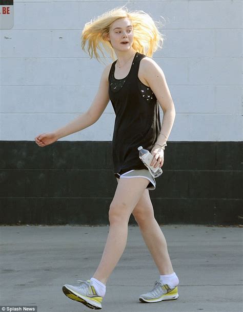 Elle Fanning Hobbles Out Of Dance Class With Trainers Falling Off Her