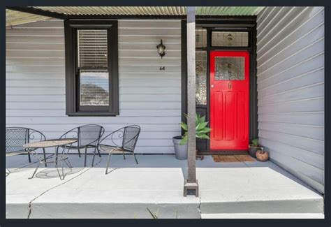 The email or password you entered is incorrect. Front porch of 1910 home | 1910 house, Red door, Home