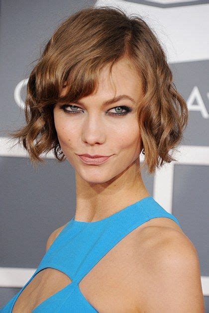 At The Grammys She Ups Her Glamour Quotient With Smoky Eyes Tousled Curls And A Creamy Nude