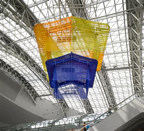 Two Fabric Homes By Artist Do Ho Suh Float Above An Atrium In Incheon