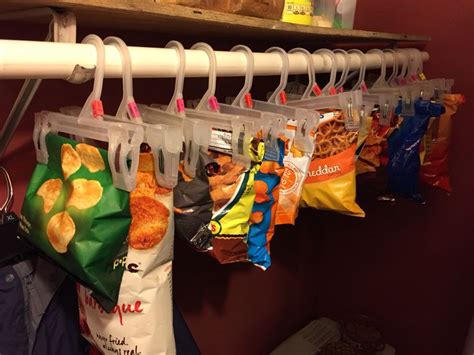Potato chip storage: Organize open bags of potato chips using hangers