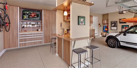 Good garage designs interior uses garage staples and pegboards as it is an economical way to store individual equipment and tools. Garage Cabinets - Modern - Garage - Cleveland - by Ohio Garage Interiors