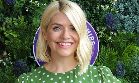 holly willoughby looks sensational in chic skiwear as she poses with rarely seen daughter hello