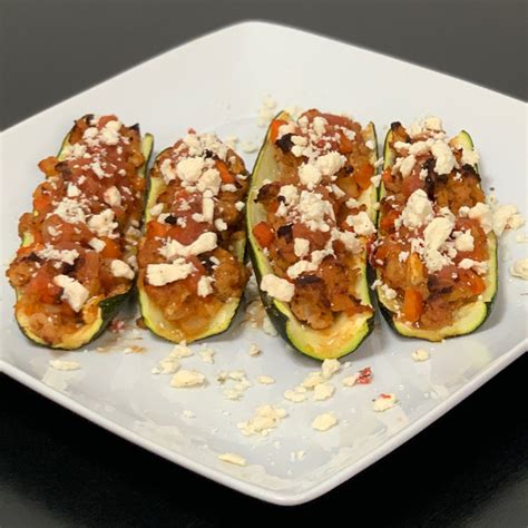 It's zucchini season and we are enjoying it every way you can the cute little zucchini boats are piled high with a warm saucy mixture loaded with lean ground meat, hearty beans and a smattering of flavorful spices. Southwest Zucchini Boats - The Realistic Dietitian | Macros Registered Dietitian