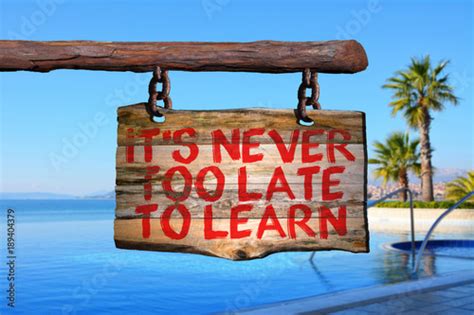 Its Never Too Late To Learn Motivational Phrase Sign Stock Photo And