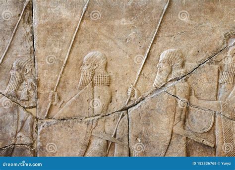 Ancient Assyrian Relief Depicting Winged Gods Or S Stock Photo
