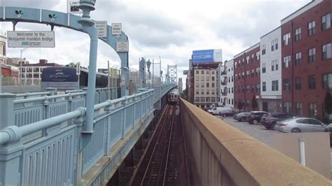 A Patco Train Crossing The Ben Franklin Bridge From Philadelphia To