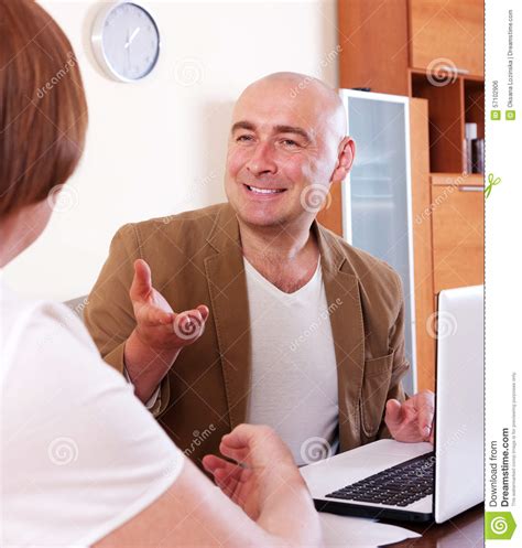 Mature Woman Answer Questions Stock Photo Image Of Finance Keeping