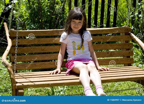 Pretty Child On Bench Royalty Free Stock Photography Image 1584997