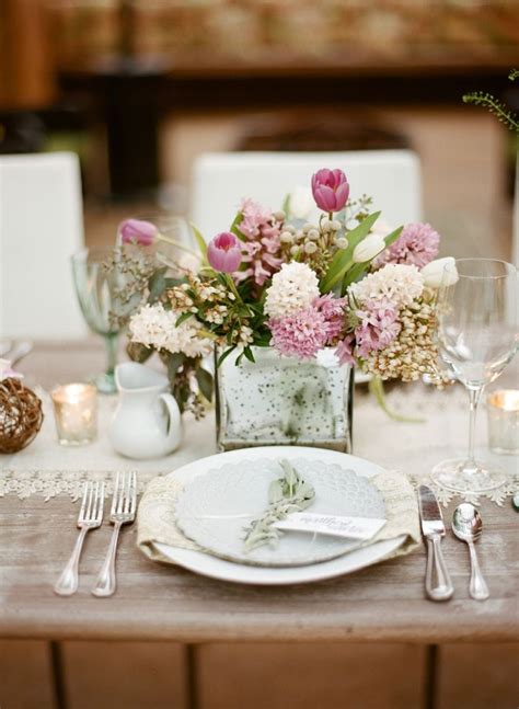Head table at rustic wedding with bridal bouquets. Pin on Centerpieces