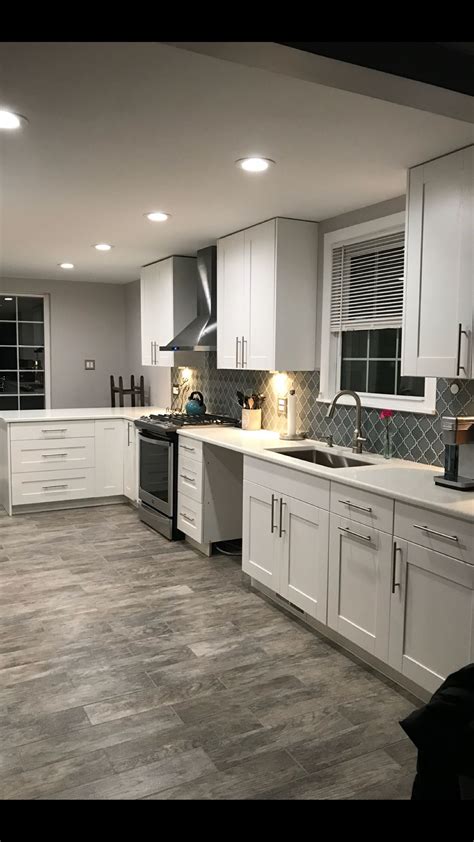 Warm tones warm colors such as reds, oranges and yellows are best used with warmer looking gray colored flooring. THIS EXACT COLOR SCHEME!! White cabinets, white trim ...