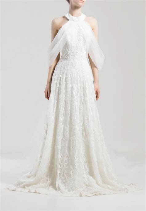 Long Ivory Halter Neck Dress Fully Beaded And Embroidered With A Tulle
