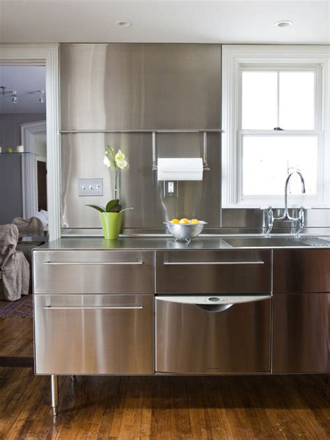 The color changes based on the surrounding area. Stainless Steel Backsplash | Houzz