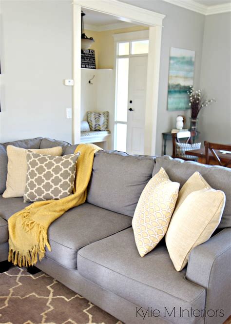 Looking to spruce up your living room without spending a fortune or a complete overhaul? How to make a gray paint colour feel warm. Shown in living ...