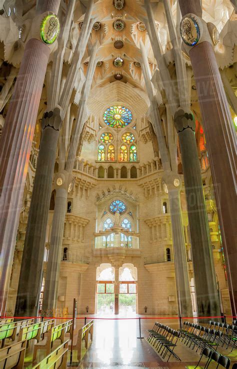 The basílica de la sagrada família, also known as the sagrada família, is a large unfinished roman catholic minor basilica in the eixample district of barcelona, catalonia, spain. Spain, Barcelona, La sagrada familia, Interior of ...