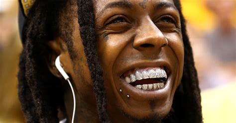 We're told it was a we're told during the eight hour procedure, wayne had his grill worked on, several tooth implants. Lil Wayne and the flag: No desecration intended