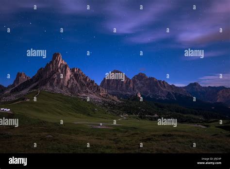 Gusela Mountain In A Starry Night With Clouds Giau Pass Dolomites