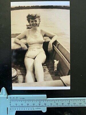 VINTAGE REPRINTED PHOTO Sexy Girl In Boat In Tight Perky Vintage