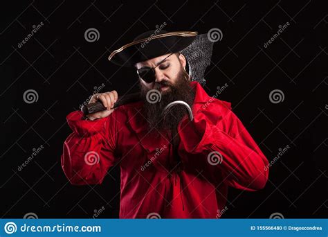 Thoughtful Man In A Pirate Clothes For Carnival With A Hook Insted Of