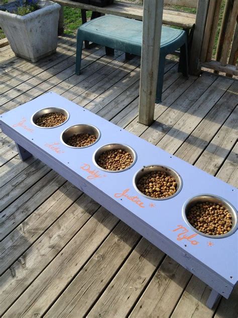 There's videos of raccoons trying hard (and failing) at breaking in, and one reviewer even mentioned an excellent diy hack in case you do 5. Dog feeding station for a home with multiple dogs | Rrruffhouse dogs | Pinterest | Dog feeding ...