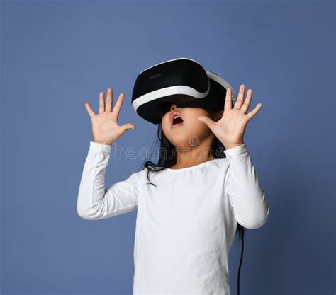 Young Girl Kid Child Play Virtual Reality Game Hold Vr Glasses And