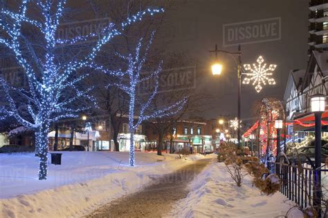 Christmas Lights On Snowy St Lambert Street At Night Quebec Canada