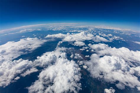 Curvature Of Planet Earth Aerial Shot Blue Sky And Clouds Acrp
