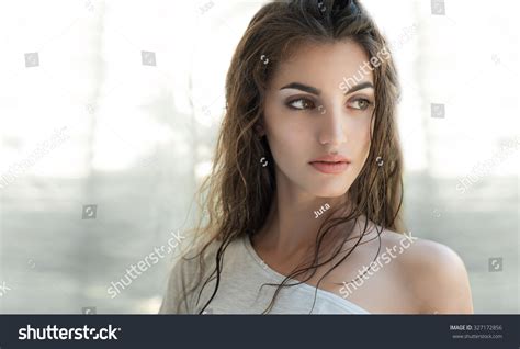 Beauty Model With Natural Nude Make Up Fresh Skin And Wet Hair S
