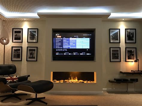 Led Up Lighting Curved Tv Set Into Wall With Water Vapour Fire Log